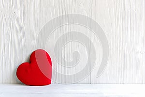 ValentineÃ¢â¬â¢s Day. Sewed pillow red hearts clothespins on the white wood planks. Happy lovers day card mockup, copy space